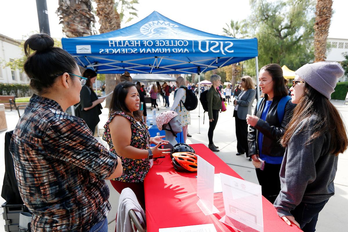 Students gather program information at health weej